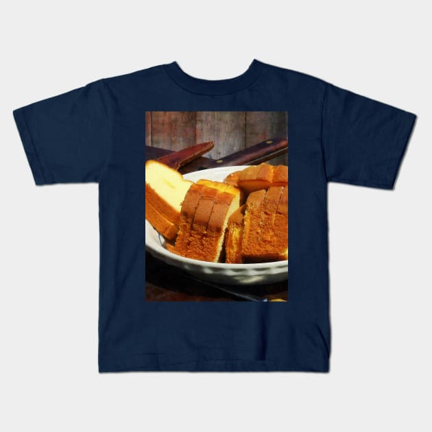 Food - Plate With Sliced Bread and Knives Kids T-Shirt by SusanSavad